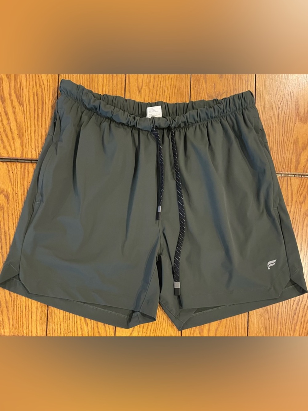 Fabletics The One short lined 5 inch, large, dark olive color